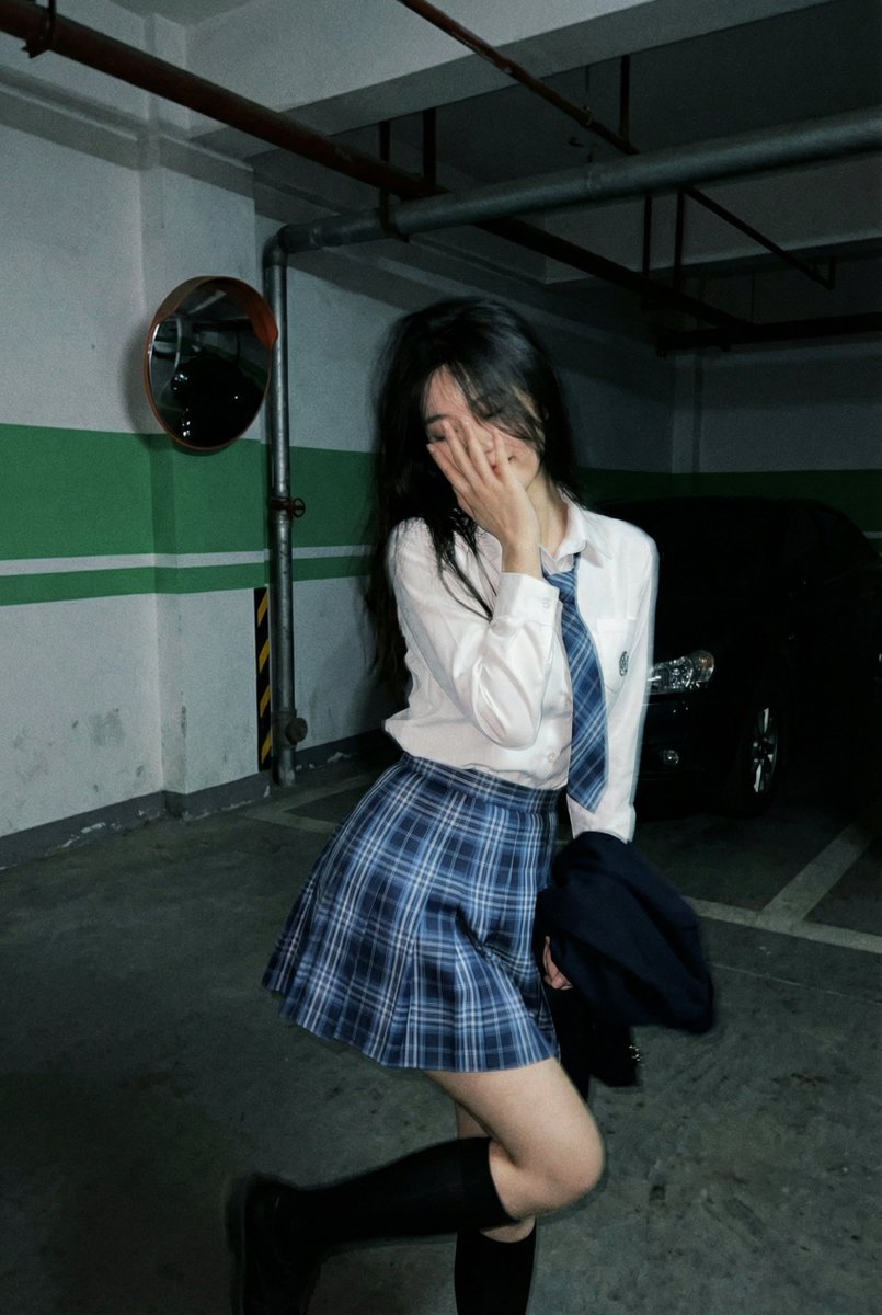 Young Adult Woman in Parking Garage, People, nanoBanana-Pro, Candid Shot, Low Light reference image