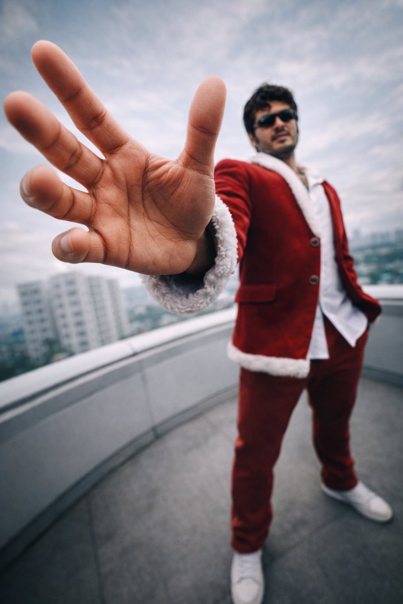 Modern Santa Man Close-Up, People, nanoBanana-Pro, Cinematic Lighting, Close-Up Hand reference image