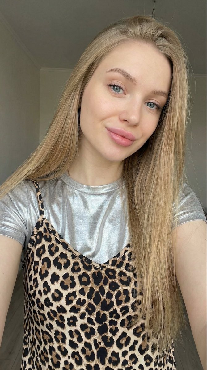 Young Beautiful Blonde Woman Close-Up Selfie