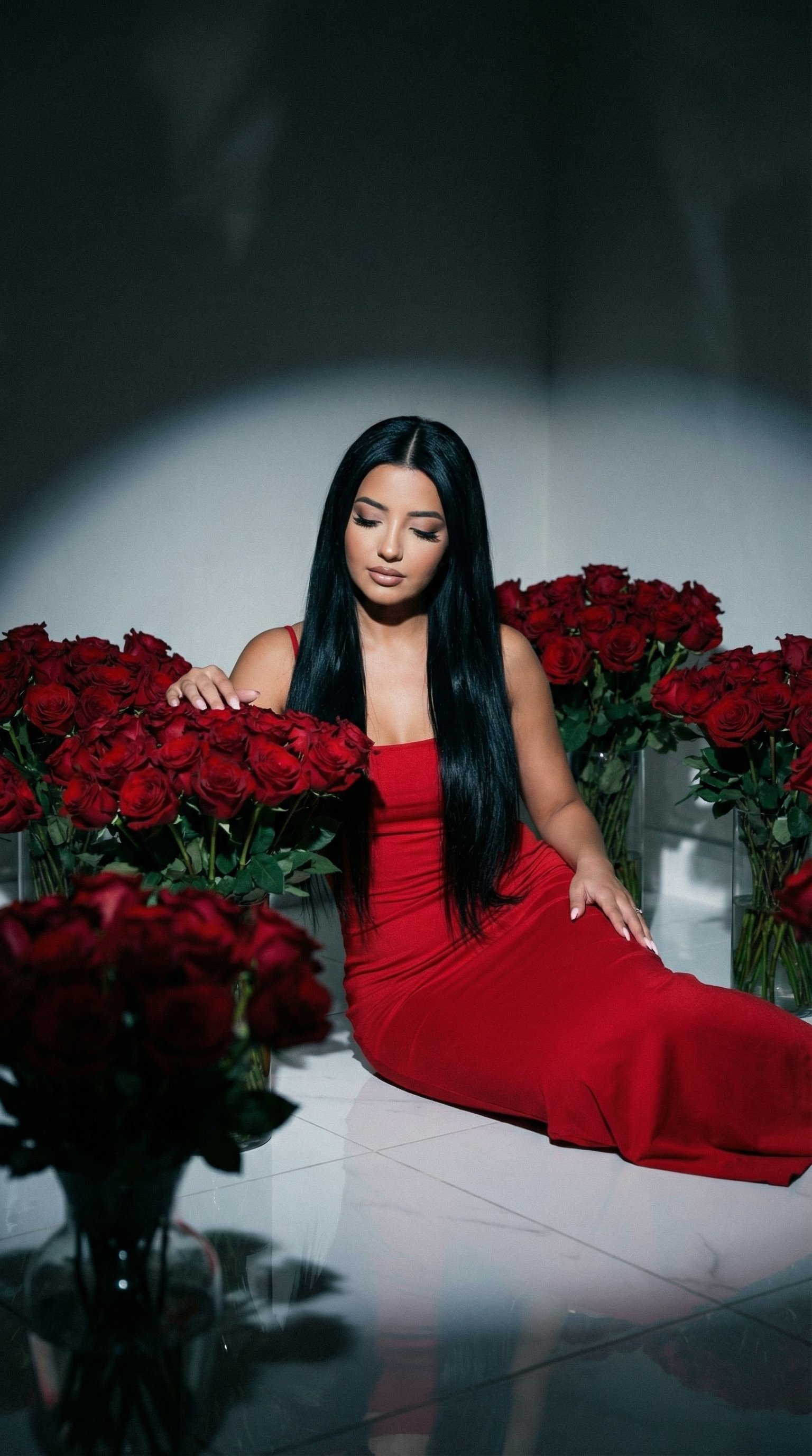 Low-Key Dramatic Portrait in a Red Rose Room
